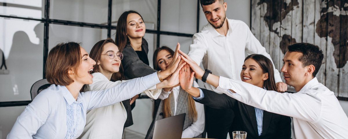 group of people working out business plan in an office